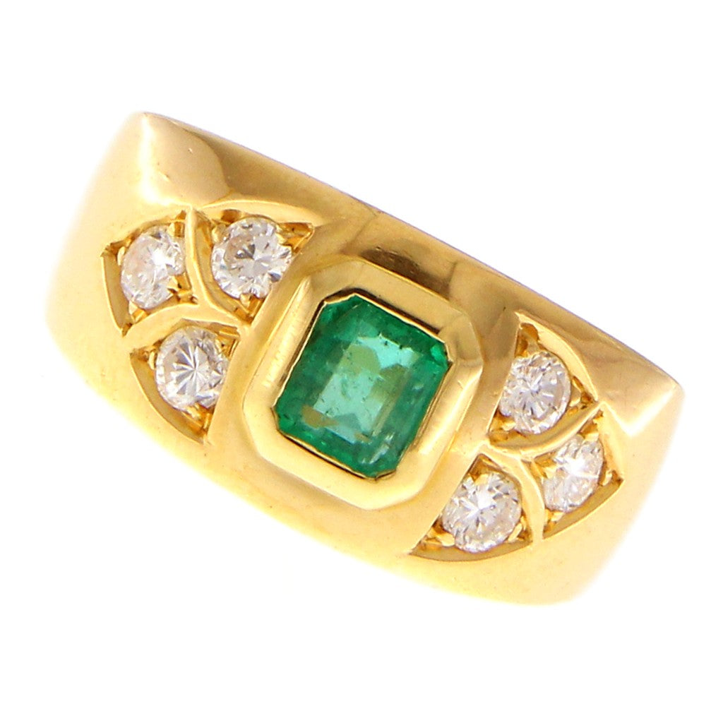 Anello con Smeraldo da 0.37 CT e Diamanti da 0.05 CT